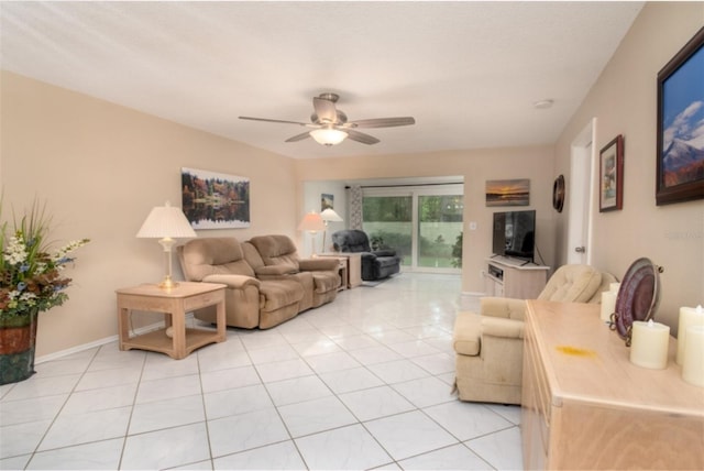 1701 Pinehurst Rd Unit 24B, Dunedin, FL 34698 - living room with light tile patterned floors and a ceiling fan