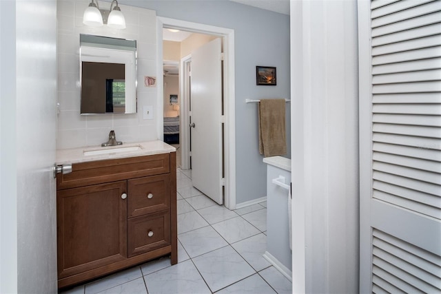 1701 Pinehurst Rd Unit 24B, Dunedin, FL 34698 - bathroom with vanity and baseboards