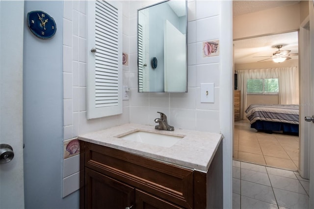 1701 Pinehurst Rd Unit 24B, Dunedin, FL 34698 - ensuite bathroom featuring vanity, a ceiling fan, and marble finish floors