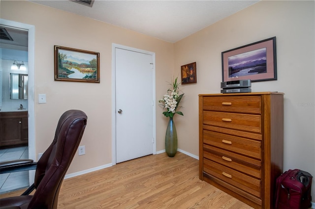 1701 Pinehurst Rd Unit 24B, Dunedin, FL 34698 - office space with light wood-style floors and baseboards