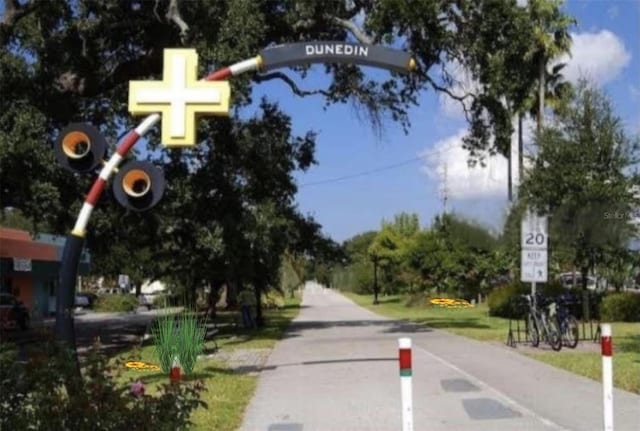 1701 Pinehurst Rd Unit 24B, Dunedin, FL 34698 - view of road featuring traffic signs