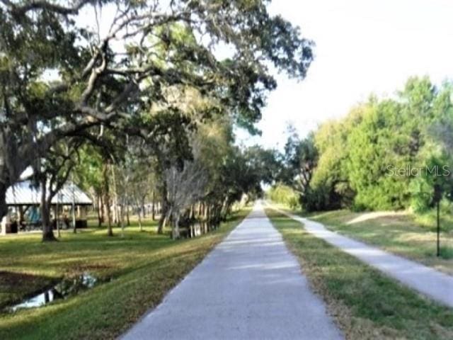 1701 Pinehurst Rd Unit 24B, Dunedin, FL 34698 - view of community with a yard