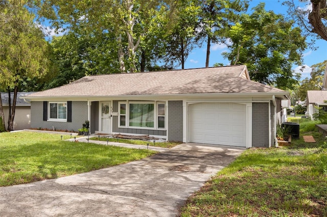 8004 Beaver Creek Loop, Hudson, FL 34667 - ranch-style home with a garage, brick siding, a front lawn, and concrete driveway