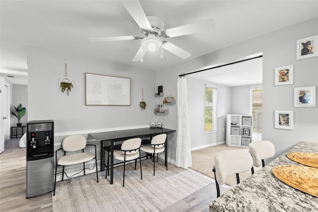 8004 Beaver Creek Loop, Hudson, FL 34667 - dining area featuring wood finished floors and ceiling fan