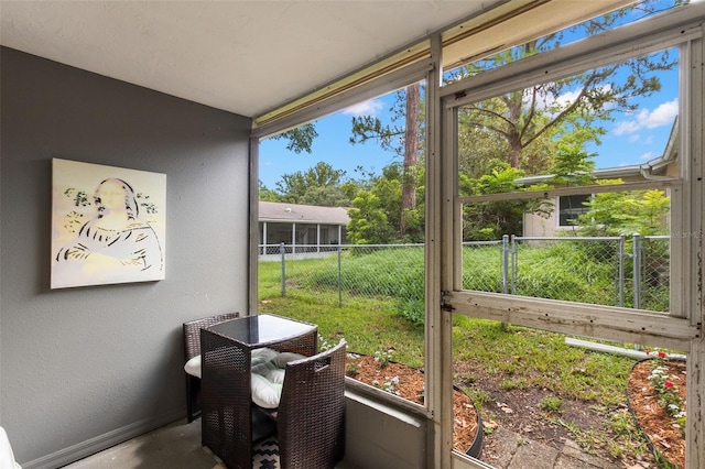 8004 Beaver Creek Loop, Hudson, FL 34667 - sunroom featuring plenty of natural light