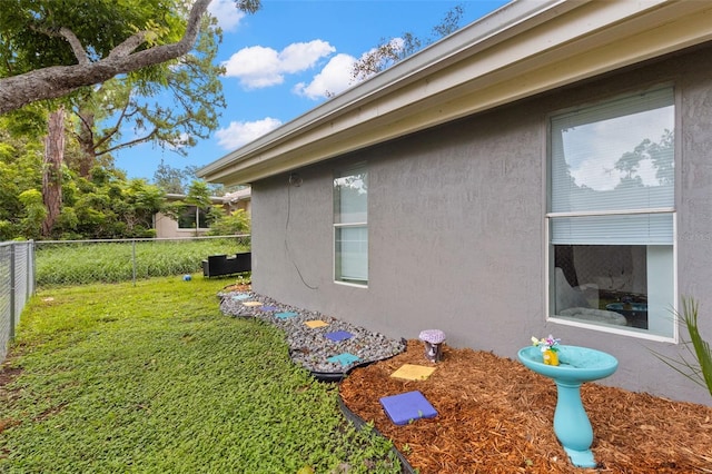 8004 Beaver Creek Loop, Hudson, FL 34667 - view of side of property featuring stucco siding