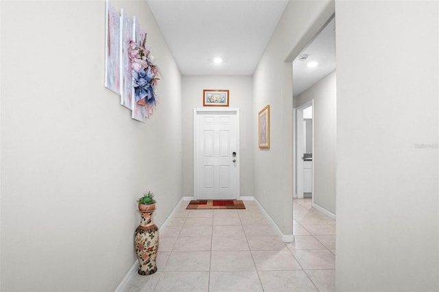 11303 Misty Moss Dr, Wimauma, FL 33598 - doorway to outside featuring light tile patterned floors and recessed lighting