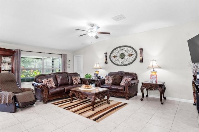 11303 Misty Moss Dr, Wimauma, FL 33598 - living area featuring vaulted ceiling, a ceiling fan, and light tile patterned floors