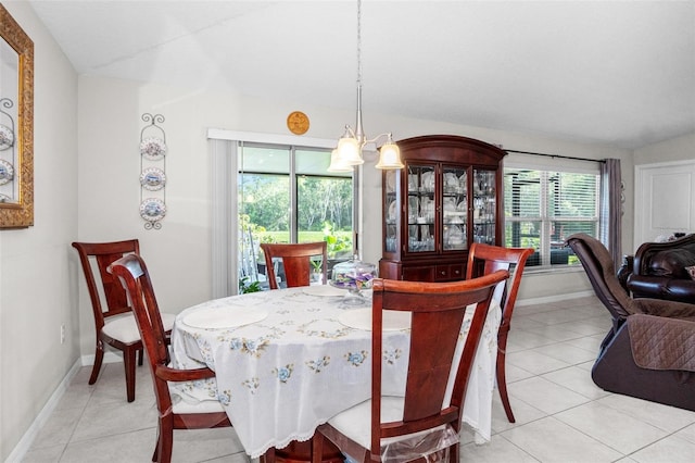 11303 Misty Moss Dr, Wimauma, FL 33598 - dining area featuring baseboards and light tile patterned flooring