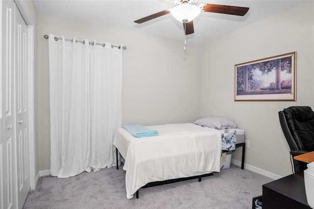 11303 Misty Moss Dr, Wimauma, FL 33598 - carpeted bedroom with a closet and a ceiling fan