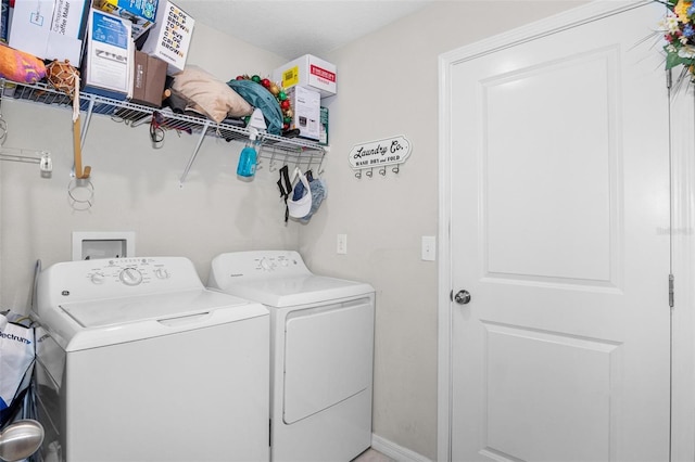 11303 Misty Moss Dr, Wimauma, FL 33598 - laundry area with independent washer and dryer and baseboards