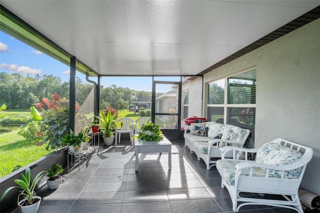 11303 Misty Moss Dr, Wimauma, FL 33598 - sunroom featuring outdoor lounge area