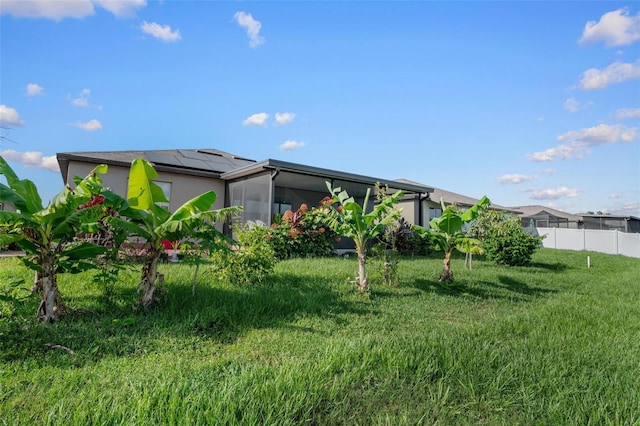 11303 Misty Moss Dr, Wimauma, FL 33598 - view of yard with a sunroom