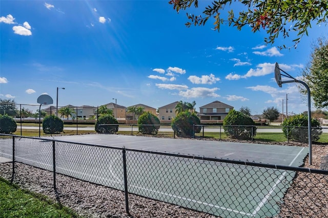 11303 Misty Moss Dr, Wimauma, FL 33598 - view of basketball court with community basketball court and a residential view