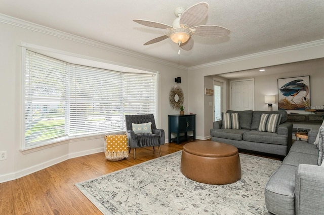 1304 63rd St NW, Bradenton, FL 34209 - living area with crown molding, wood finished floors, and a ceiling fan