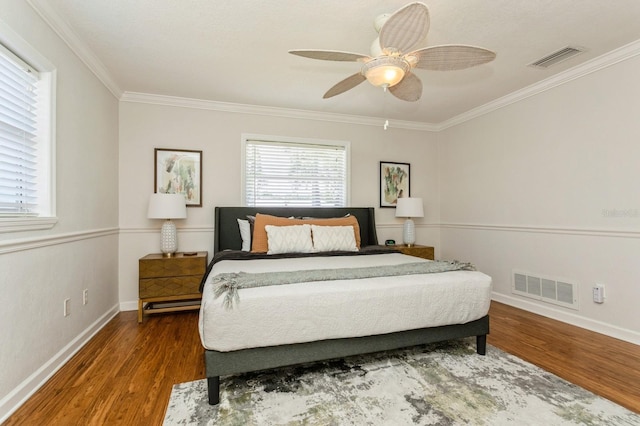 1304 63rd St NW, Bradenton, FL 34209 - bedroom featuring ornamental molding, wood finished floors, and ceiling fan