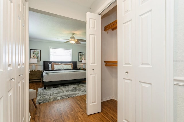 1304 63rd St NW, Bradenton, FL 34209 - bedroom featuring wood finished floors, ornamental molding, and a ceiling fan