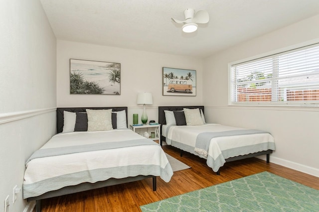 1304 63rd St NW, Bradenton, FL 34209 - bedroom featuring wood finished floors and baseboards