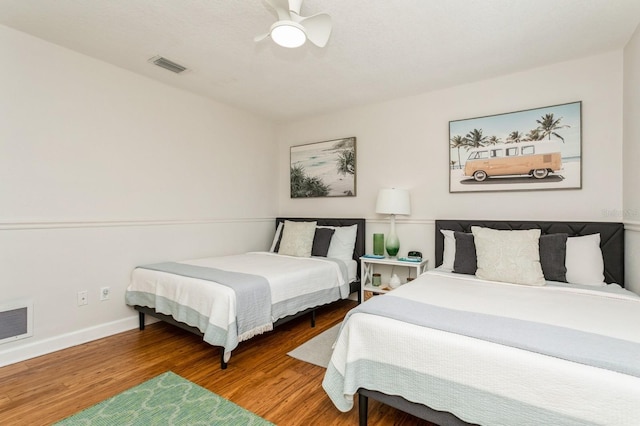 1304 63rd St NW, Bradenton, FL 34209 - bedroom featuring wood finished floors and a ceiling fan