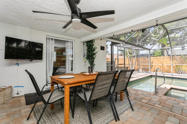 1304 63rd St NW, Bradenton, FL 34209 - view of patio / terrace featuring a ceiling fan, glass enclosure, and outdoor dining area