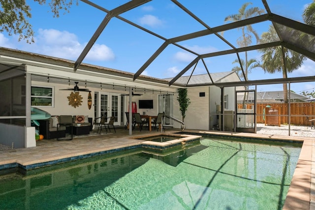 1304 63rd St NW, Bradenton, FL 34209 - back of property with french doors, a patio, ceiling fan, and an outdoor pool