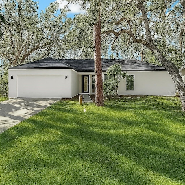 4346 Marine Pkwy, New Port Richey, FL 34652 - single story home featuring a garage, driveway, and a front yard