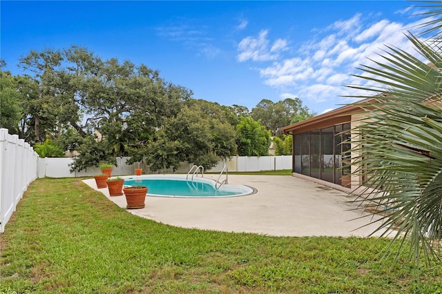 9311 136th Way, Seminole, FL 33776 - view of swimming pool with a sunroom, a fenced backyard, and a patio area