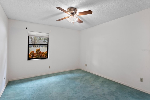 9311 136th Way, Seminole, FL 33776 - unfurnished room with carpet flooring, ceiling fan, and a textured ceiling