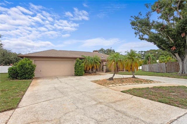 9311 136th Way, Seminole, FL 33776 - view of front of property featuring driveway and a garage
