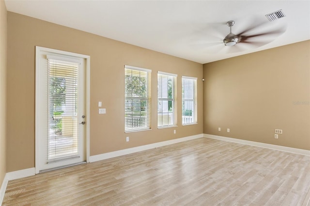 221 Sunset Crest Ct, Apollo Beach, FL 33572 - empty room featuring ceiling fan and light wood-type flooring