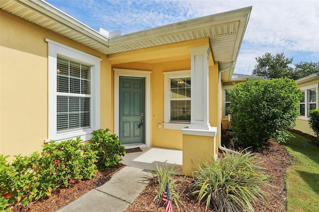 221 Sunset Crest Ct, Apollo Beach, FL 33572 - view of exterior entry with stucco siding