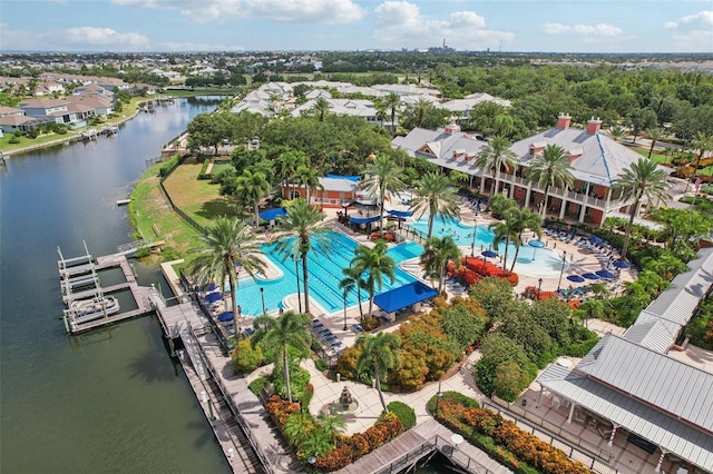 221 Sunset Crest Ct, Apollo Beach, FL 33572 - drone / aerial view of a pool area and a nearby body of water