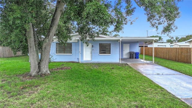 6228 Florida Cir W, Apollo Beach, FL 33572 - ranch-style home with driveway and an attached carport
