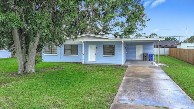 6228 Florida Cir W, Apollo Beach, FL 33572 - ranch-style home featuring driveway and an attached carport