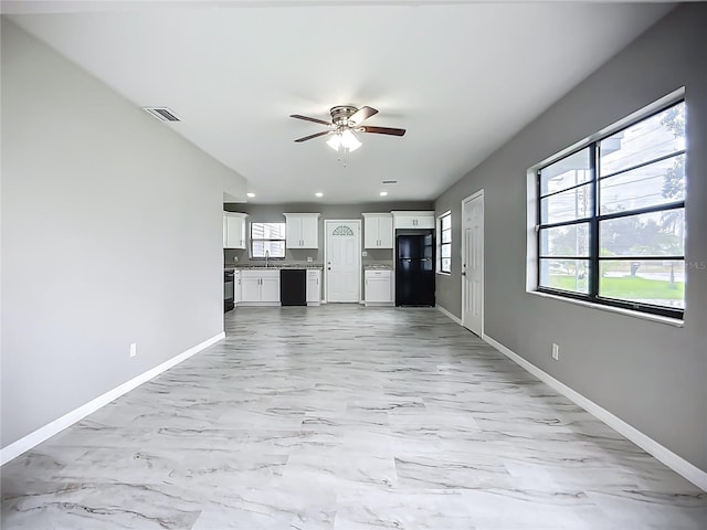 6228 Florida Cir W, Apollo Beach, FL 33572 - unfurnished living room featuring ceiling fan, recessed lighting, and light marble finish flooring