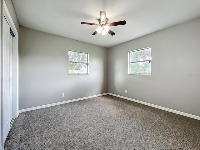 6228 Florida Cir W, Apollo Beach, FL 33572 - unfurnished room featuring carpet floors, plenty of natural light, and a ceiling fan