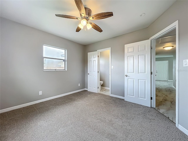 6228 Florida Cir W, Apollo Beach, FL 33572 - unfurnished bedroom featuring carpet, ensuite bath, and ceiling fan