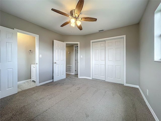 6228 Florida Cir W, Apollo Beach, FL 33572 - unfurnished bedroom featuring carpet flooring, a closet, and ceiling fan