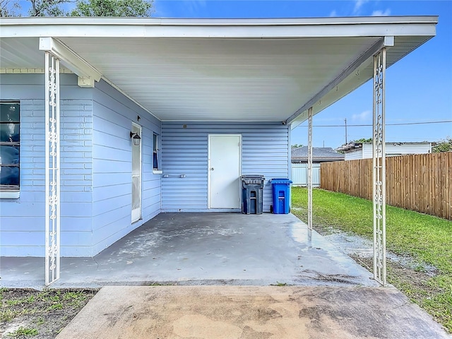 6228 Florida Cir W, Apollo Beach, FL 33572 - view of patio / terrace with a carport