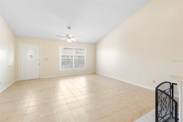 2231 Utopian Dr E Unit 307, Clearwater, FL 33763 - unfurnished living room with ceiling fan, light tile patterned floors, and a textured ceiling