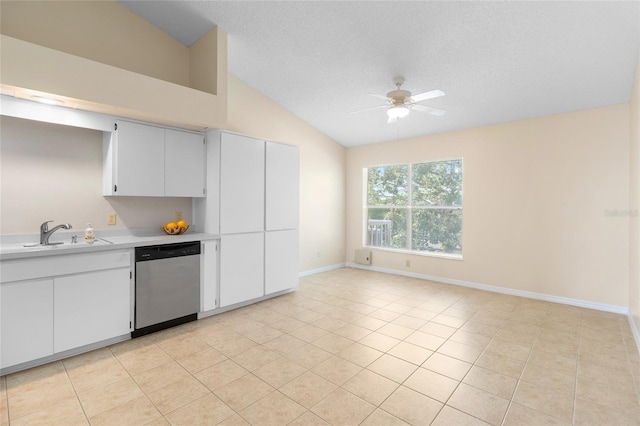 2231 Utopian Dr E Unit 307, Clearwater, FL 33763 - kitchen featuring stainless steel dishwasher, light countertops, lofted ceiling, a ceiling fan, and light tile patterned floors