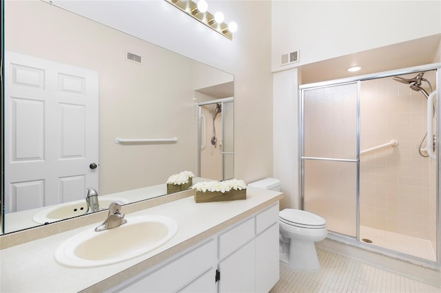 2231 Utopian Dr E Unit 307, Clearwater, FL 33763 - full bathroom with a stall shower, vanity, and tile patterned floors