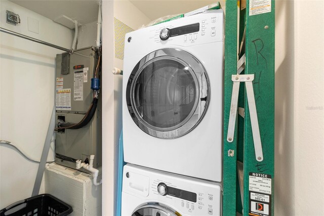 2231 Utopian Dr E Unit 307, Clearwater, FL 33763 - laundry room with estacked washer and dryer