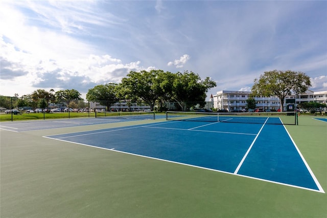2231 Utopian Dr E Unit 307, Clearwater, FL 33763 - view of tennis court featuring community basketball court