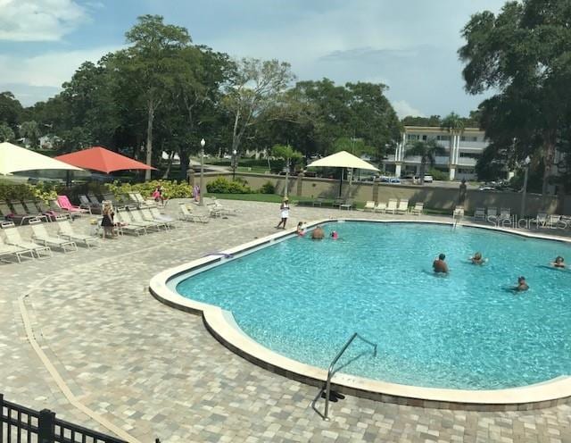 2231 Utopian Dr E Unit 307, Clearwater, FL 33763 - community pool with a patio area