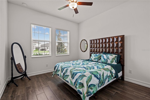 22034 Storybook Cabin Way, Land O Lakes, FL 34637 - bedroom featuring dark wood-type flooring and a ceiling fan