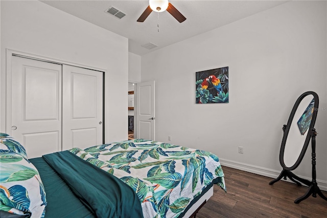 22034 Storybook Cabin Way, Land O Lakes, FL 34637 - bedroom featuring dark wood finished floors, a closet, and a ceiling fan