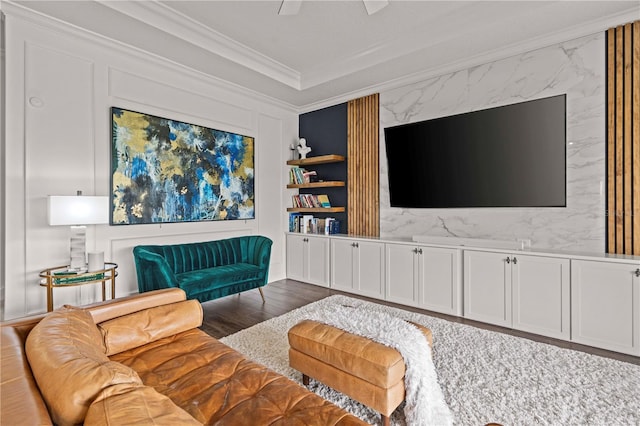 22034 Storybook Cabin Way, Land O Lakes, FL 34637 - living area featuring crown molding, wood finished floors, and a ceiling fan