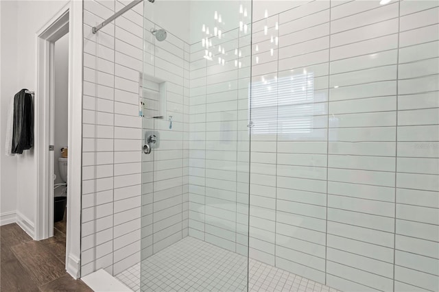 22034 Storybook Cabin Way, Land O Lakes, FL 34637 - bathroom with a stall shower and wood finished floors