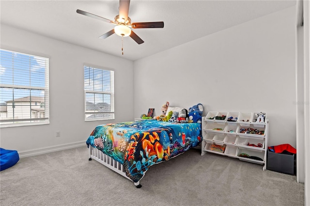 22034 Storybook Cabin Way, Land O Lakes, FL 34637 - carpeted bedroom with baseboards and ceiling fan